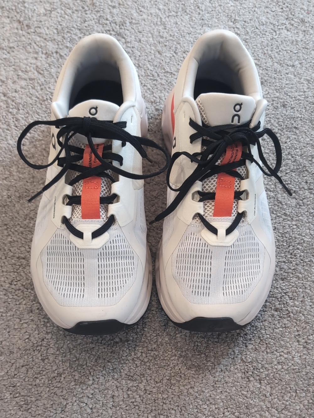 On Running Unisex White Running Shoes with Orange Accent
